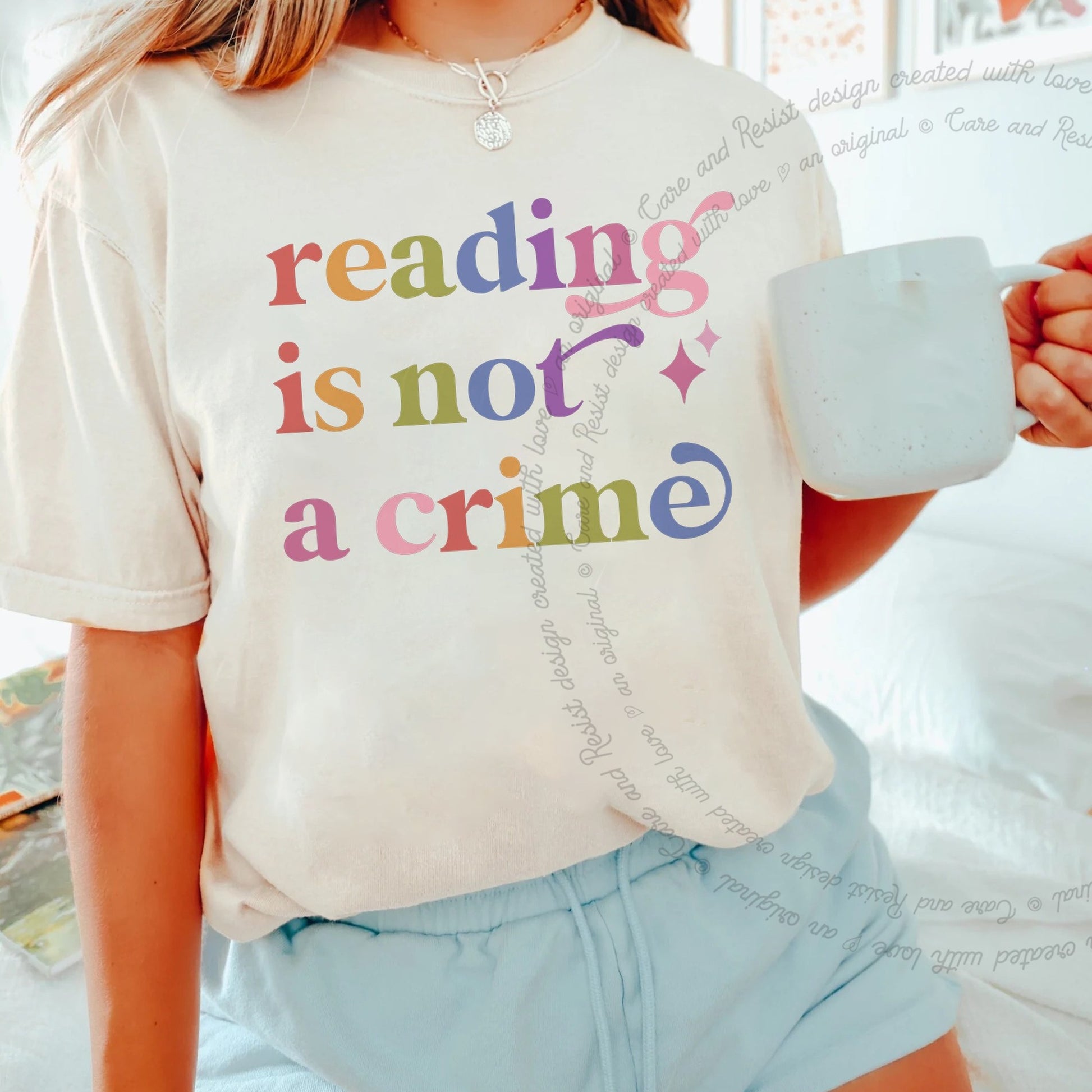 Reading is not a Crime Care & Resist rainbow tee