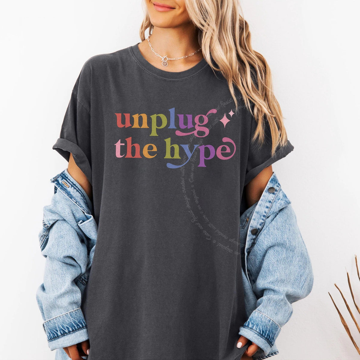 Unplug the Hype Care & Resist rainbow tee