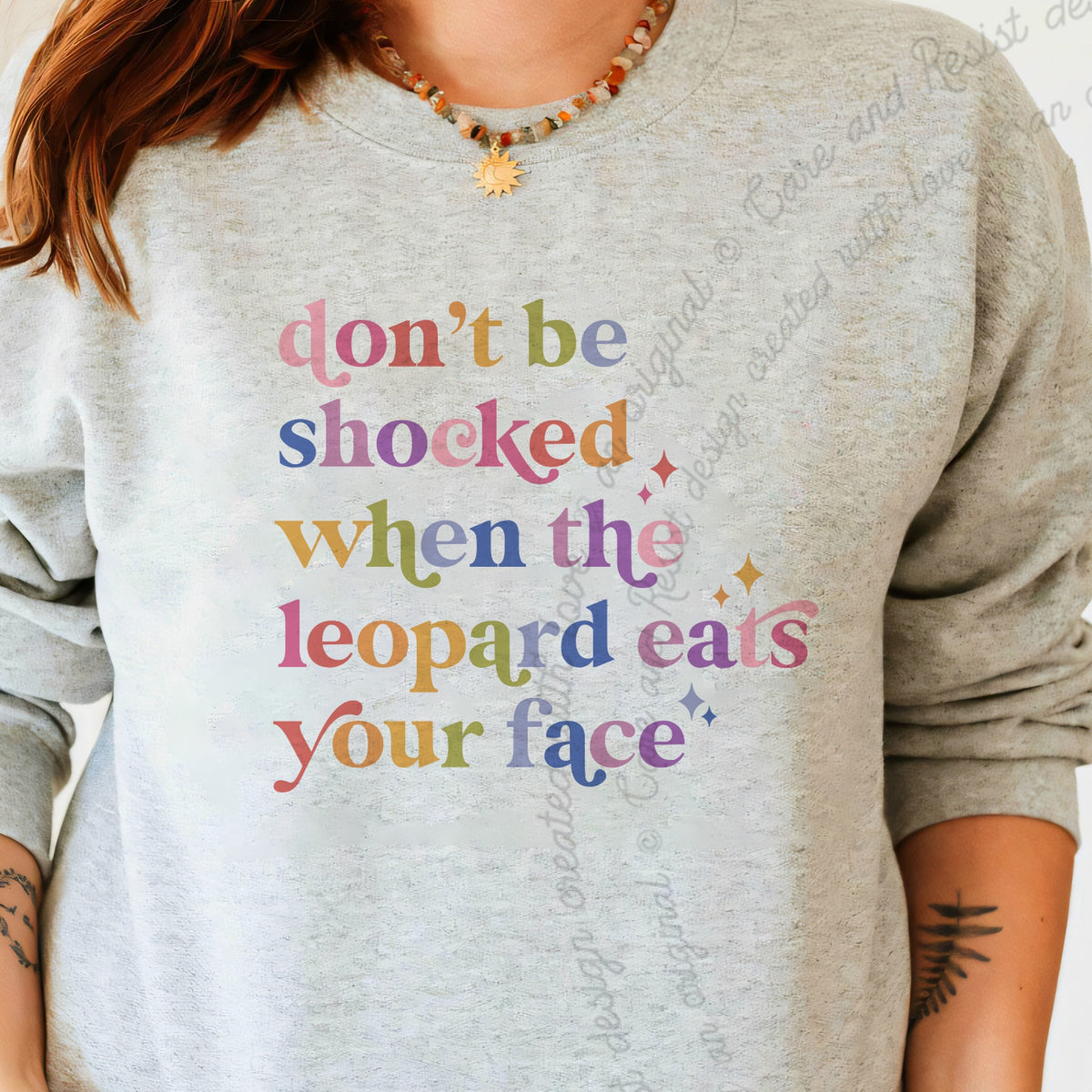 Don't Be Shocked When the Leopard Eats Your Face Care & Resist Gildan crewneck sweatshirt in Sport Grey