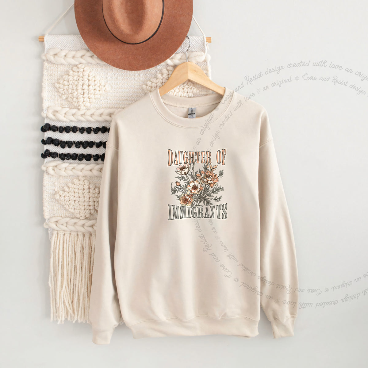 Daughter of Immigrants Care & Resist Gildan crewneck sweatshirt in Sand