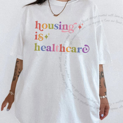 Housing is Healthcare Care & Resist rainbow Comfort Colors tee, White