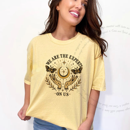 We are the Experts on Us Celestial Care & Resist progressive t-shirt in Banana