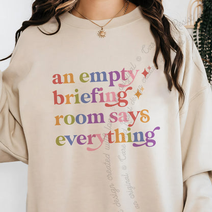 An Empty Briefing Room Says Everything Care & Resist Gildan crewneck sweatshirt in Sand