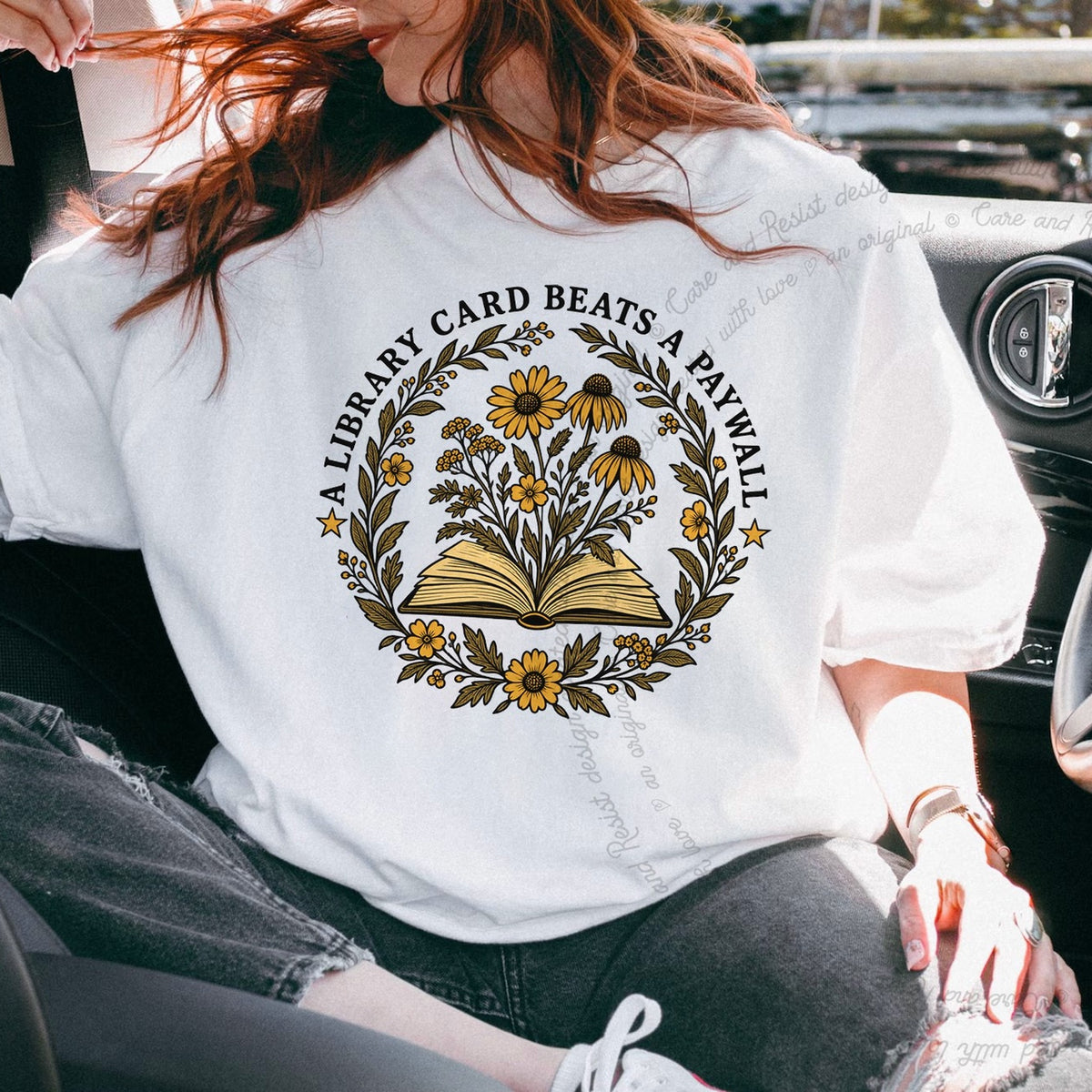 A Library Card Beats a Paywall Badge Care & Resist progressive t-shirt in White