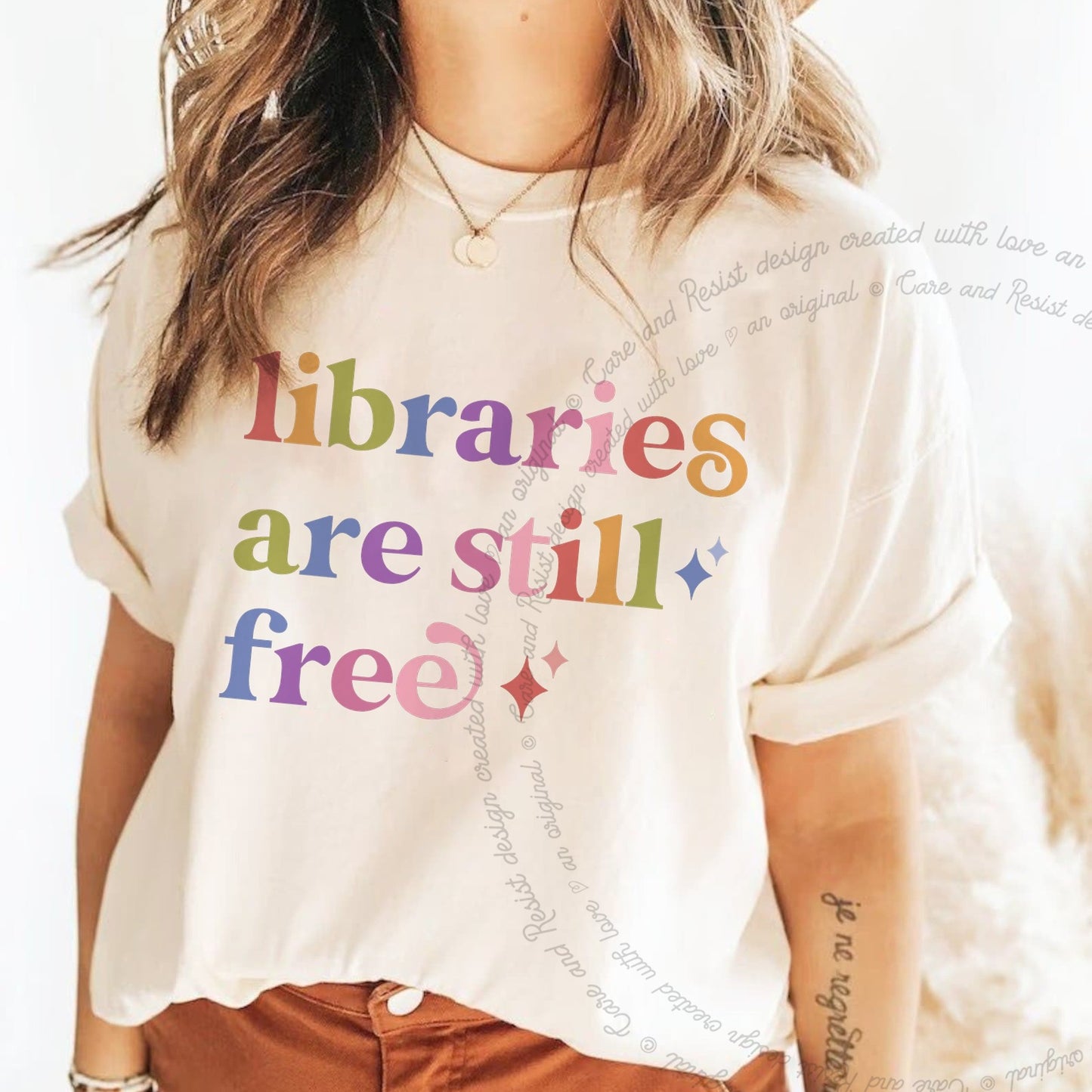 Libraries are Still Free Care & Resist rainbow tee