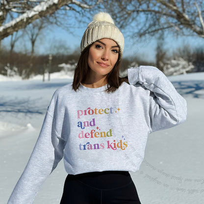 Protect and Defend Trans Kids Care & Resist Gildan crewneck sweatshirt in Sport Grey