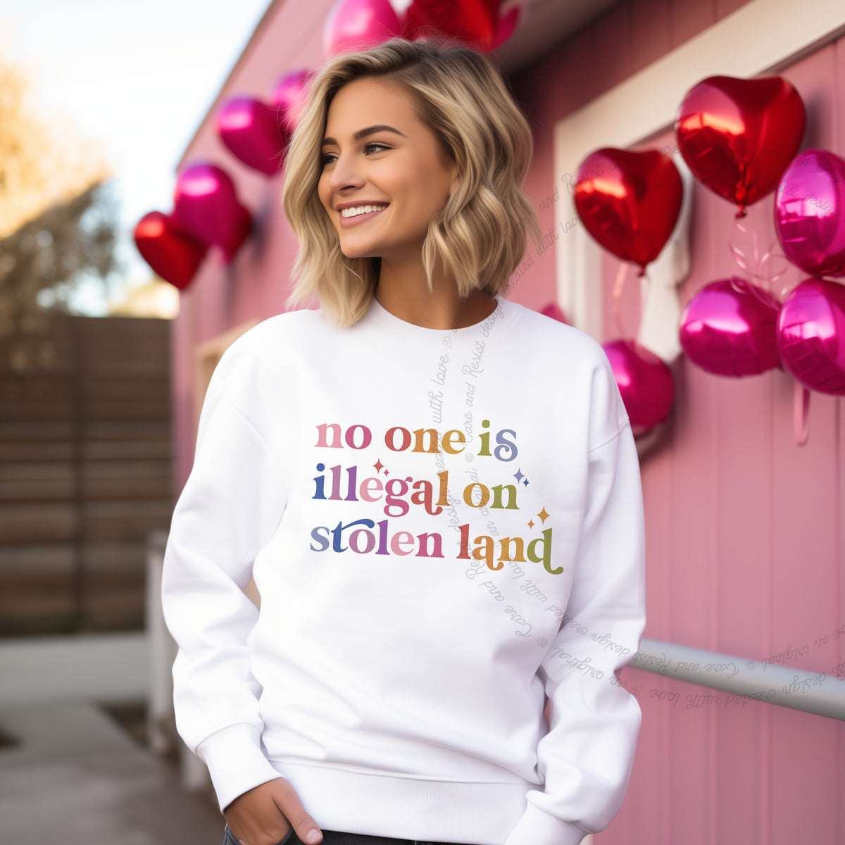 No One Is Illegal on Stolen Land Care & Resist Gildan crewneck sweatshirt in White
