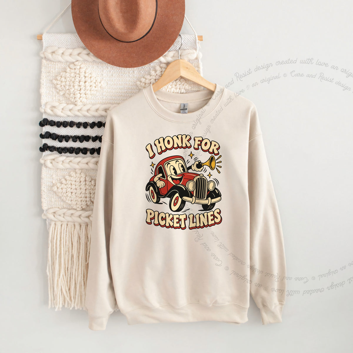 I Honk for Picket Lines Cartoon Care & Resist Gildan crewneck sweatshirt in Sand