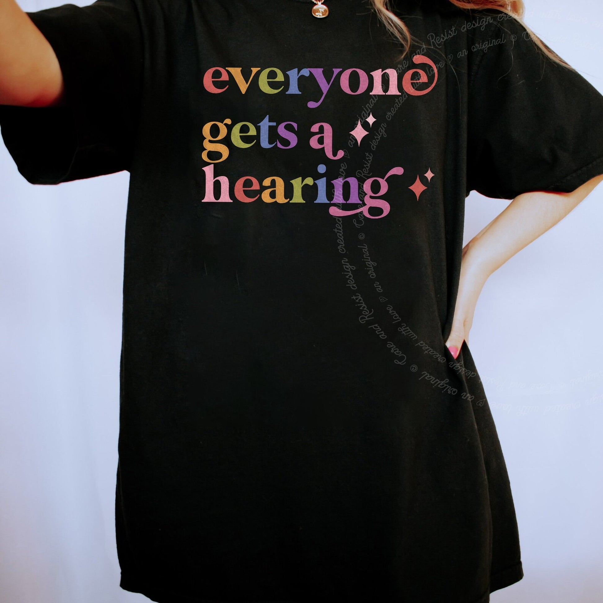 Everyone Gets a Hearing Care & Resist rainbow tee