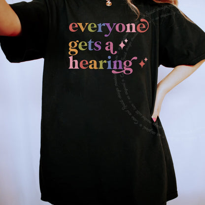 Everyone Gets a Hearing Care & Resist rainbow tee