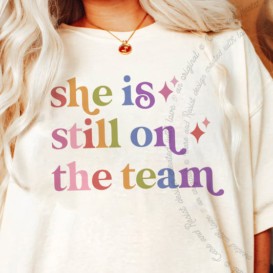 She is Still on the Team Care & Resist progressive t-shirt in Ivory