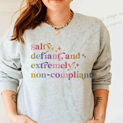 Salty, Defiant, and Extremely Non-compliant Care & Resist Gildan crewneck sweatshirt in Sport Grey