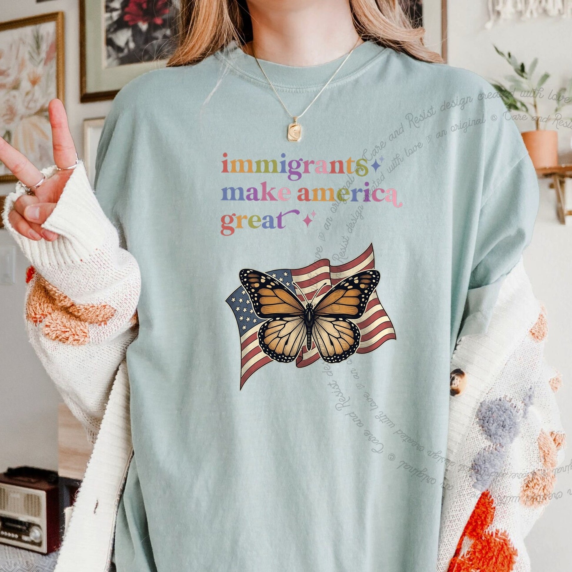 Immigrants Make America Great Care & Resist rainbow Comfort Colors tee, Bay