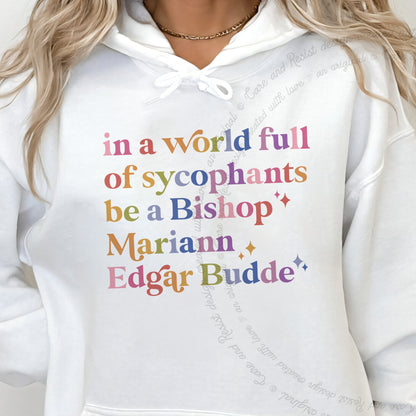 In a World Full of Sycophants Be a Bishop Mariann Edgar Budde Care & Resist Gildan hoodie in White