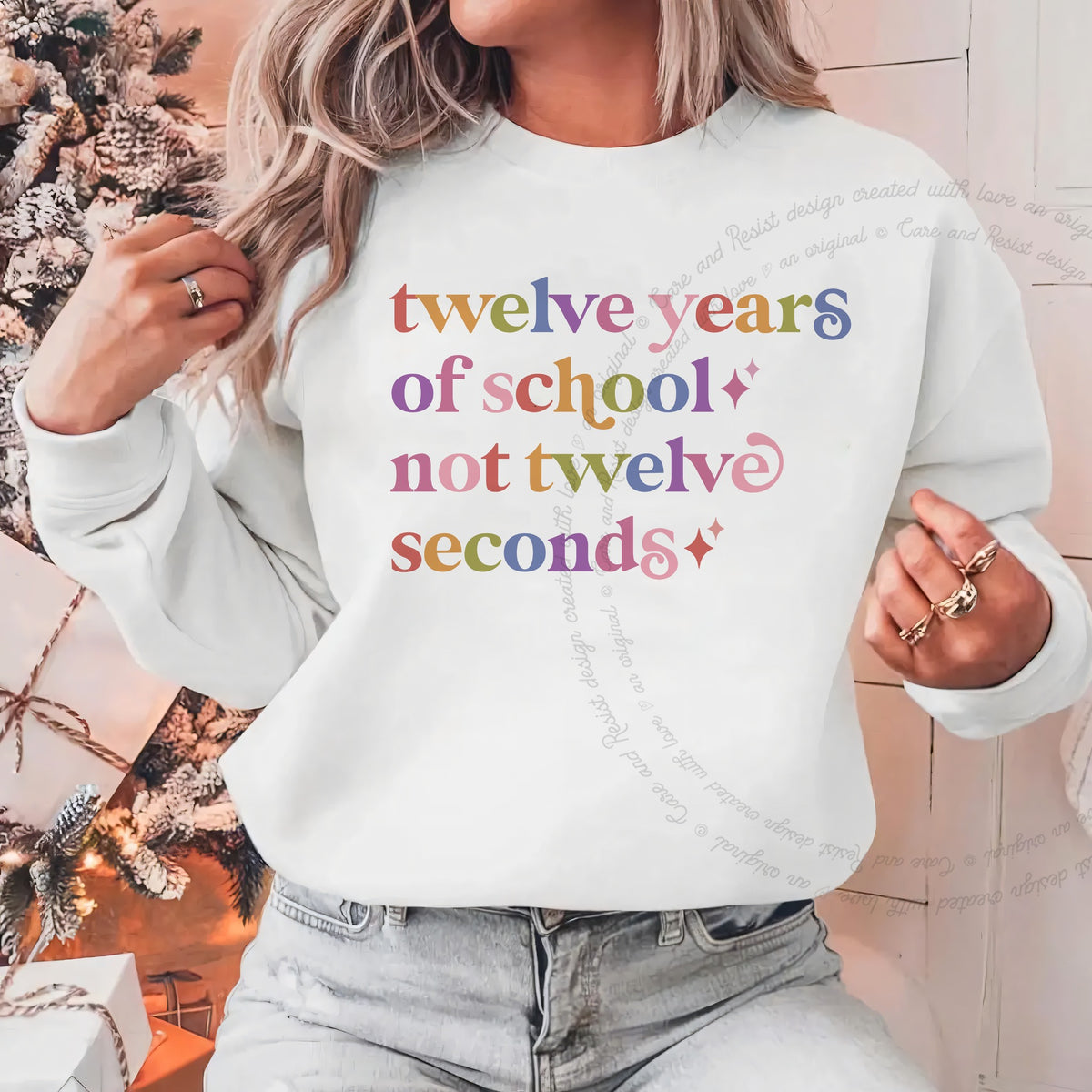 Twelve Years of School not Twelve Seconds Care & Resist Gildan crewneck sweatshirt in White