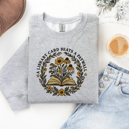 A Library Card Beats a Paywall Badge Care & Resist Gildan crewneck sweatshirt in Sport Grey