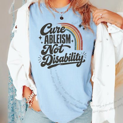 Cure Ableism not Disability Badge Care & Resist progressive t-shirt in Chambray