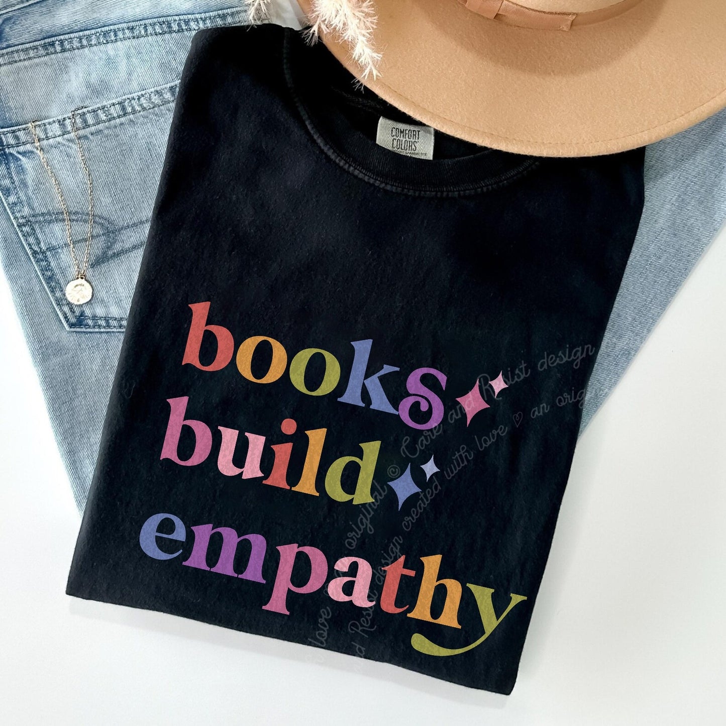 Books Build Empathy Care & Resist rainbow Comfort Colors tee, Black