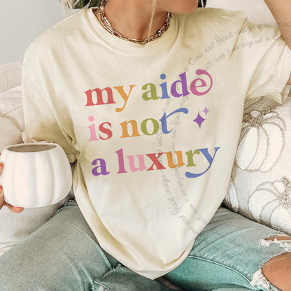 My Aide is not a Luxury Care & Resist rainbow tee