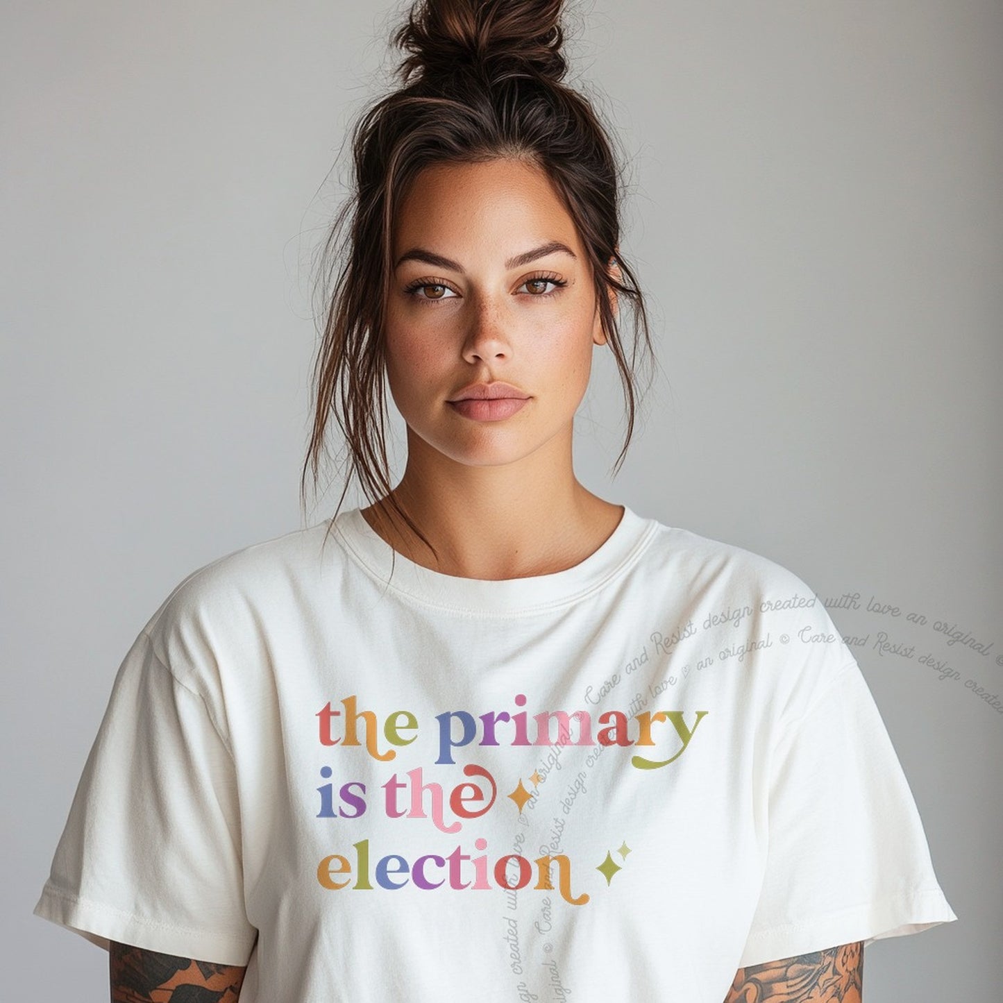 The Primary is the Election Care & Resist rainbow Comfort Colors tee, White
