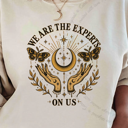 We are the Experts on Us Celestial Care & Resist Gildan crewneck sweatshirt in Sand