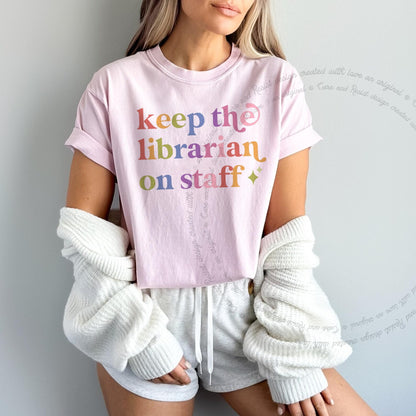 Keep the Librarian on Staff Care & Resist rainbow tee