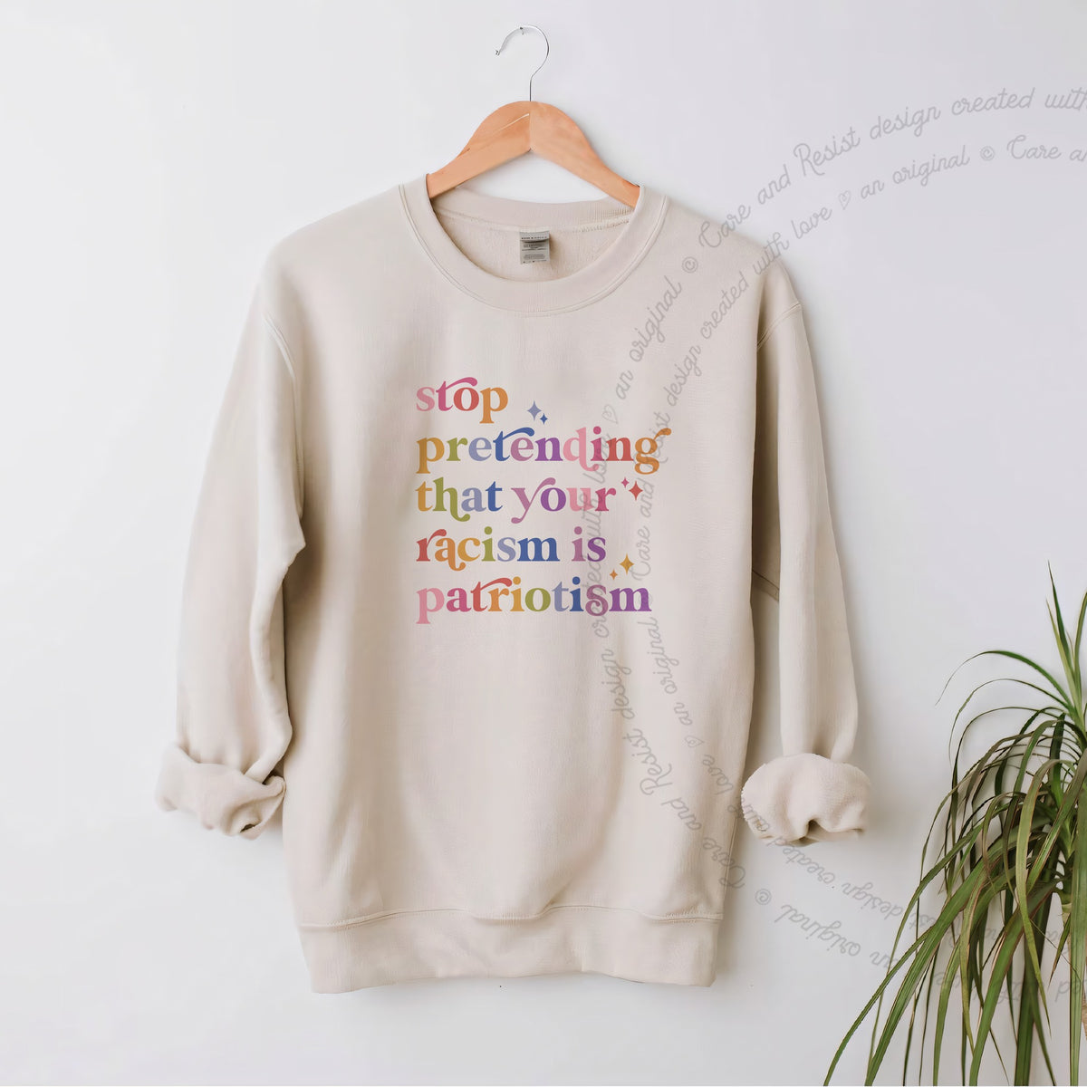 Stop Pretending That Your Racism Is Patriotism Care & Resist Gildan crewneck sweatshirt in Sand