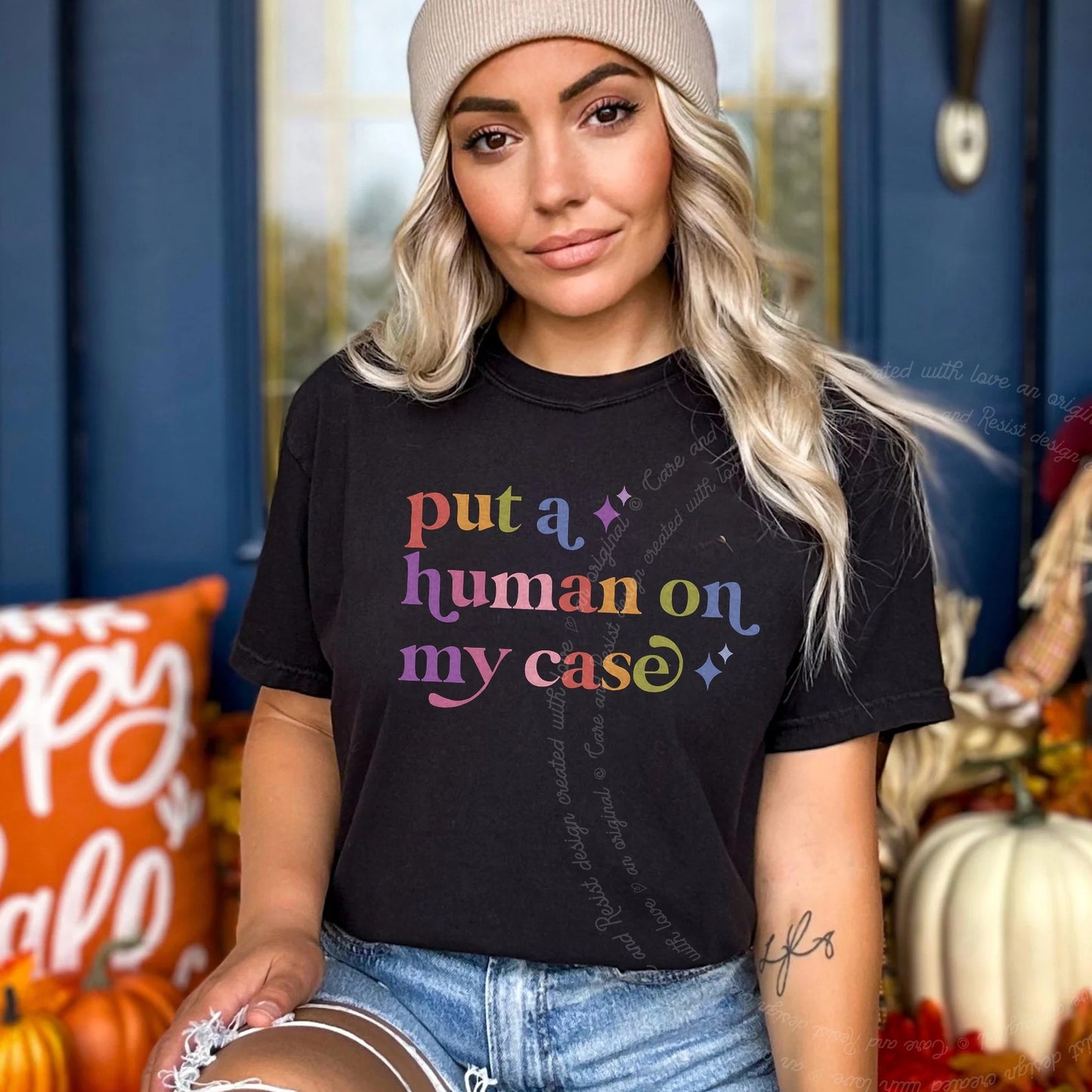 Put a Human on My Case Care & Resist rainbow Comfort Colors tee, Black