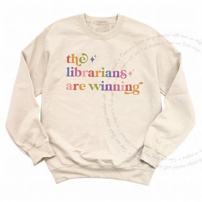 The Librarians are Winning Care & Resist Gildan crewneck sweatshirt in Sand