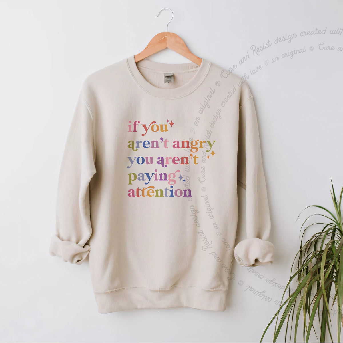If You Aren't Angry You Aren't Paying Attention Care & Resist Gildan crewneck sweatshirt in Sand