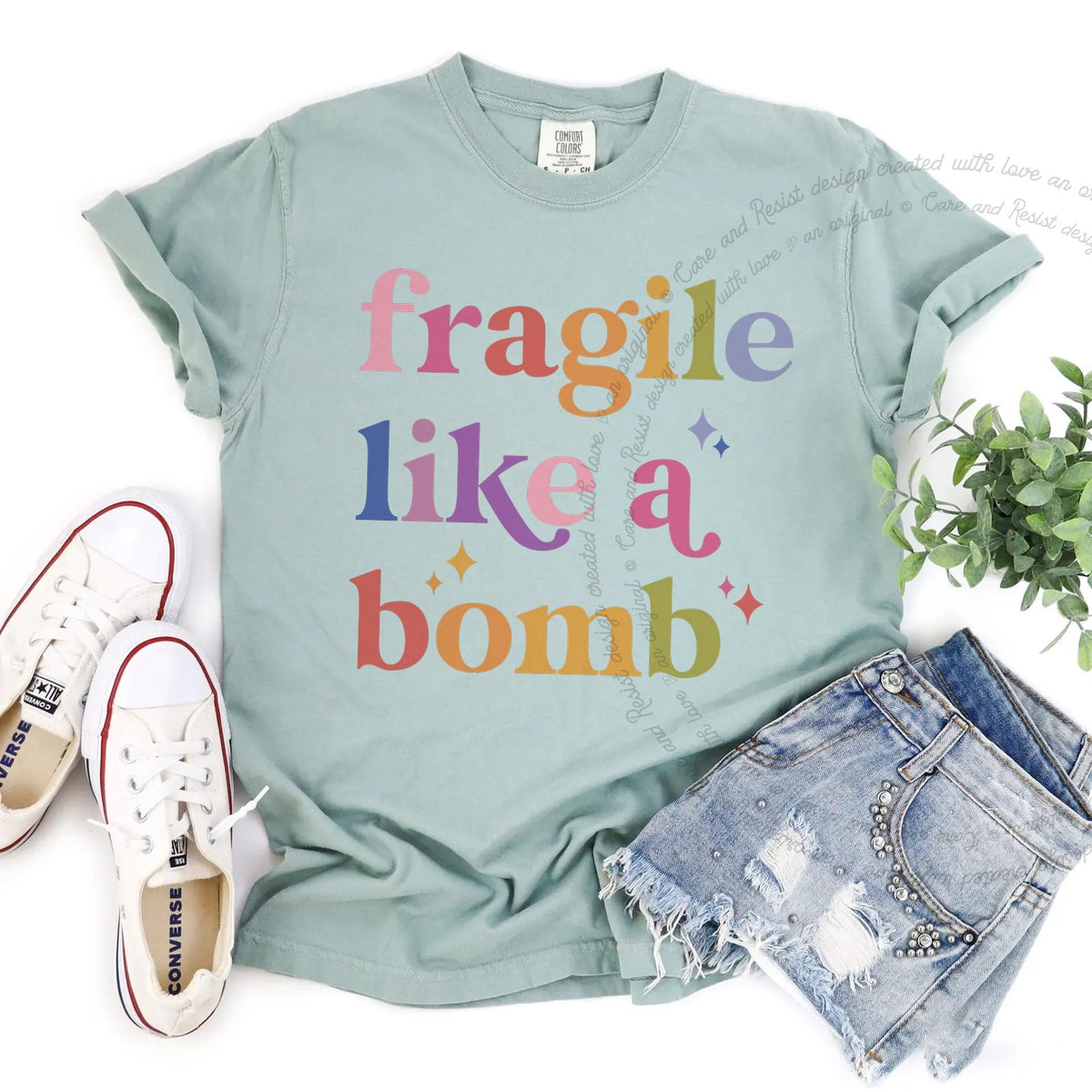 Fragile Like a Bomb Care & Resist progressive t-shirt in Bay