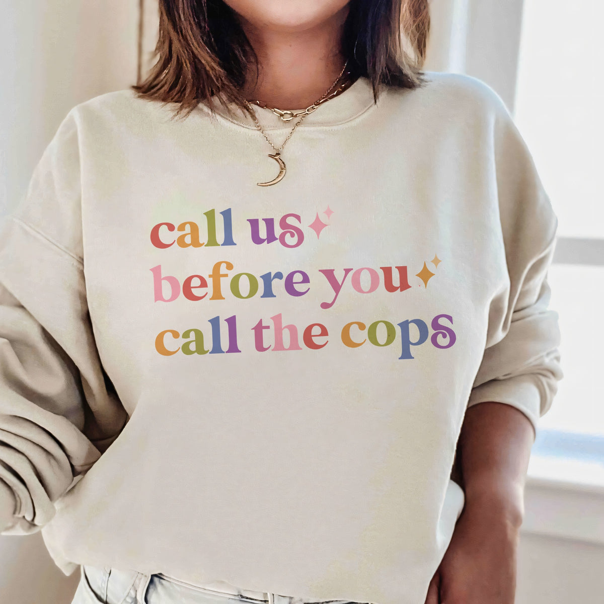 Call Us Before You Call the Cops Care & Resist Gildan crewneck sweatshirt in Sand