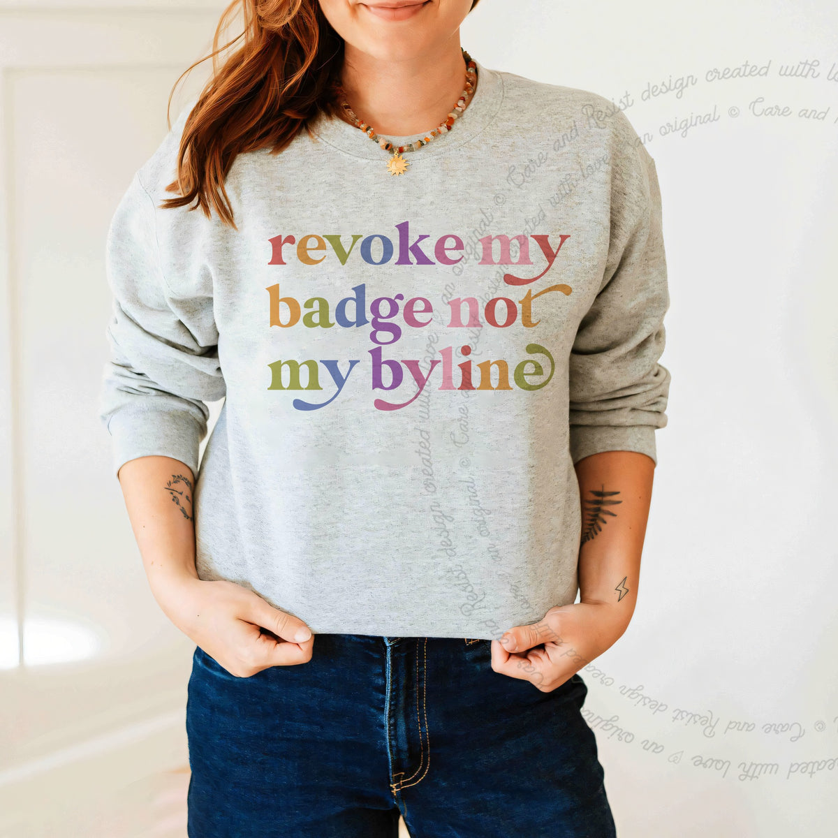 Revoke My Badge not My Byline Care & Resist Gildan crewneck sweatshirt in Sport Grey
