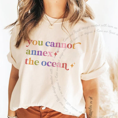 You Cannot Annex the Ocean Care & Resist rainbow tee