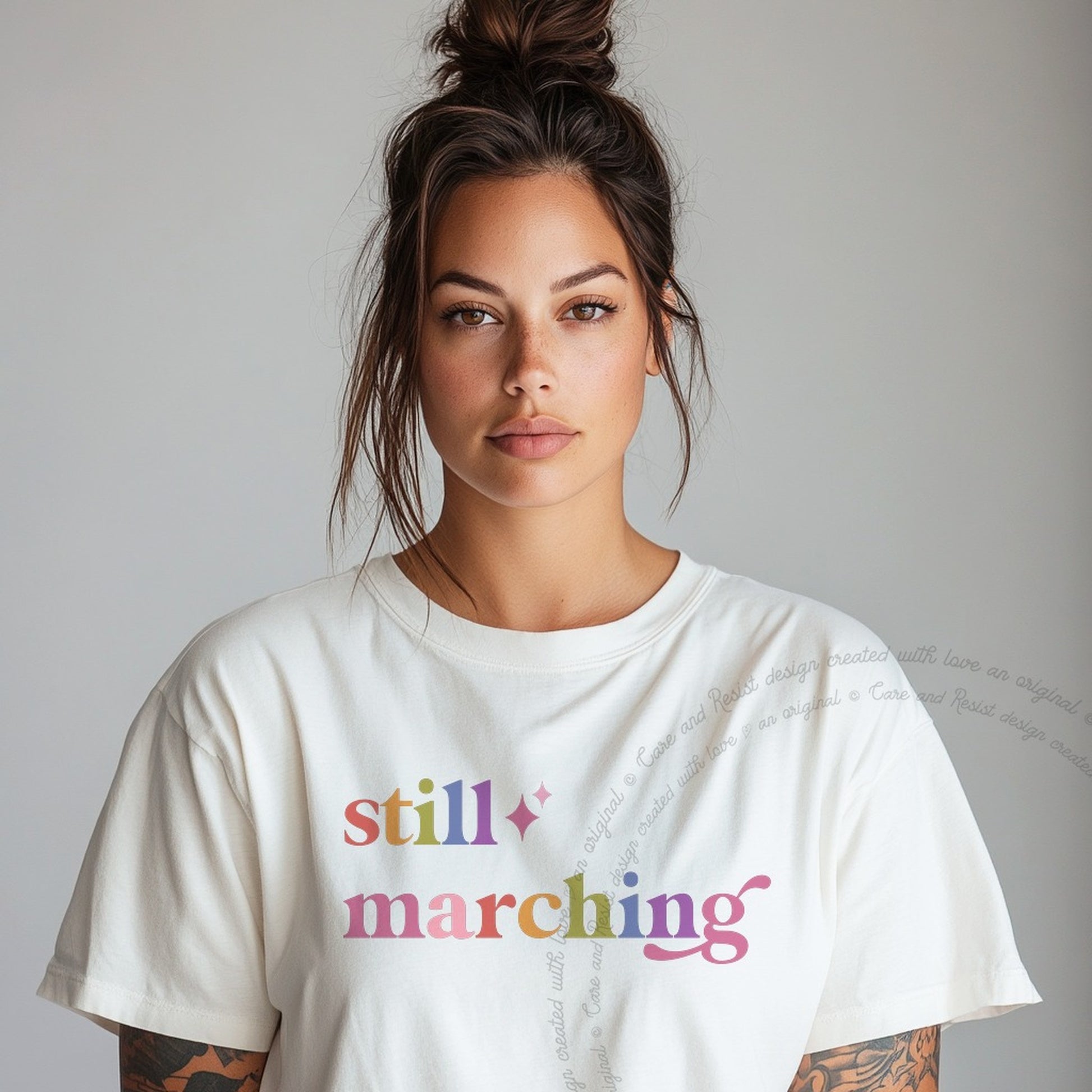 Still Marching Care & Resist rainbow tee