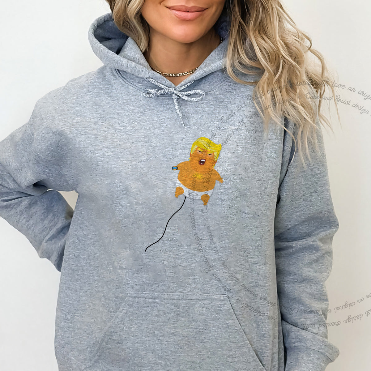 Trump Baby Blimp Care & Resist Gildan hoodie in Sport Grey