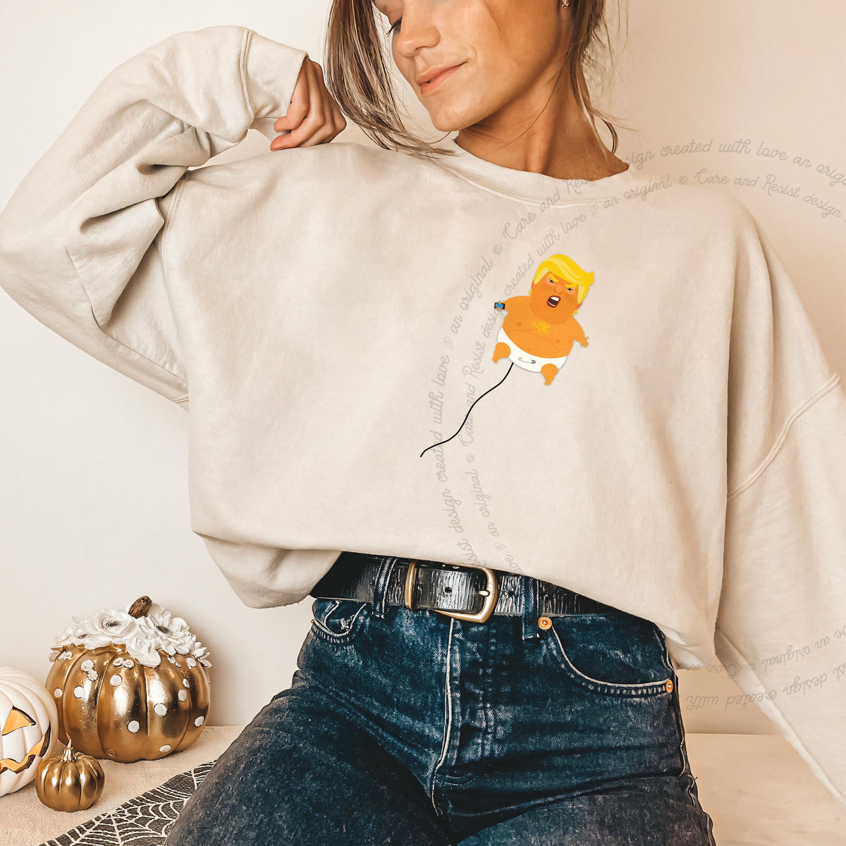 Trump Baby Blimp Care & Resist Gildan crewneck sweatshirt in Sand