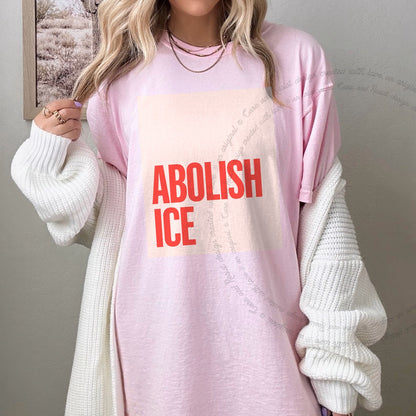 Abolish ICE Care & Resist progressive t-shirt in Blossom