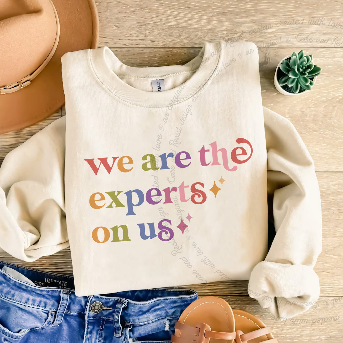We are the Experts on Us Care & Resist Gildan crewneck sweatshirt in Sand
