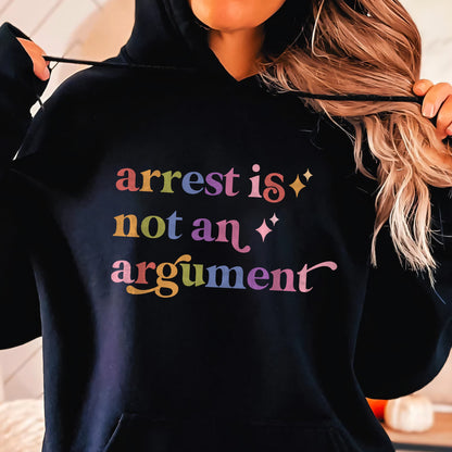 Arrest is not an Argument Care & Resist Gildan hoodie in Black