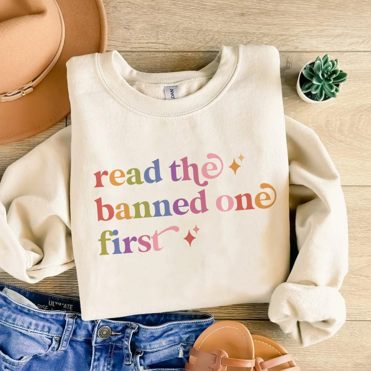 Read the Banned One First Care & Resist Gildan crewneck sweatshirt in Sand
