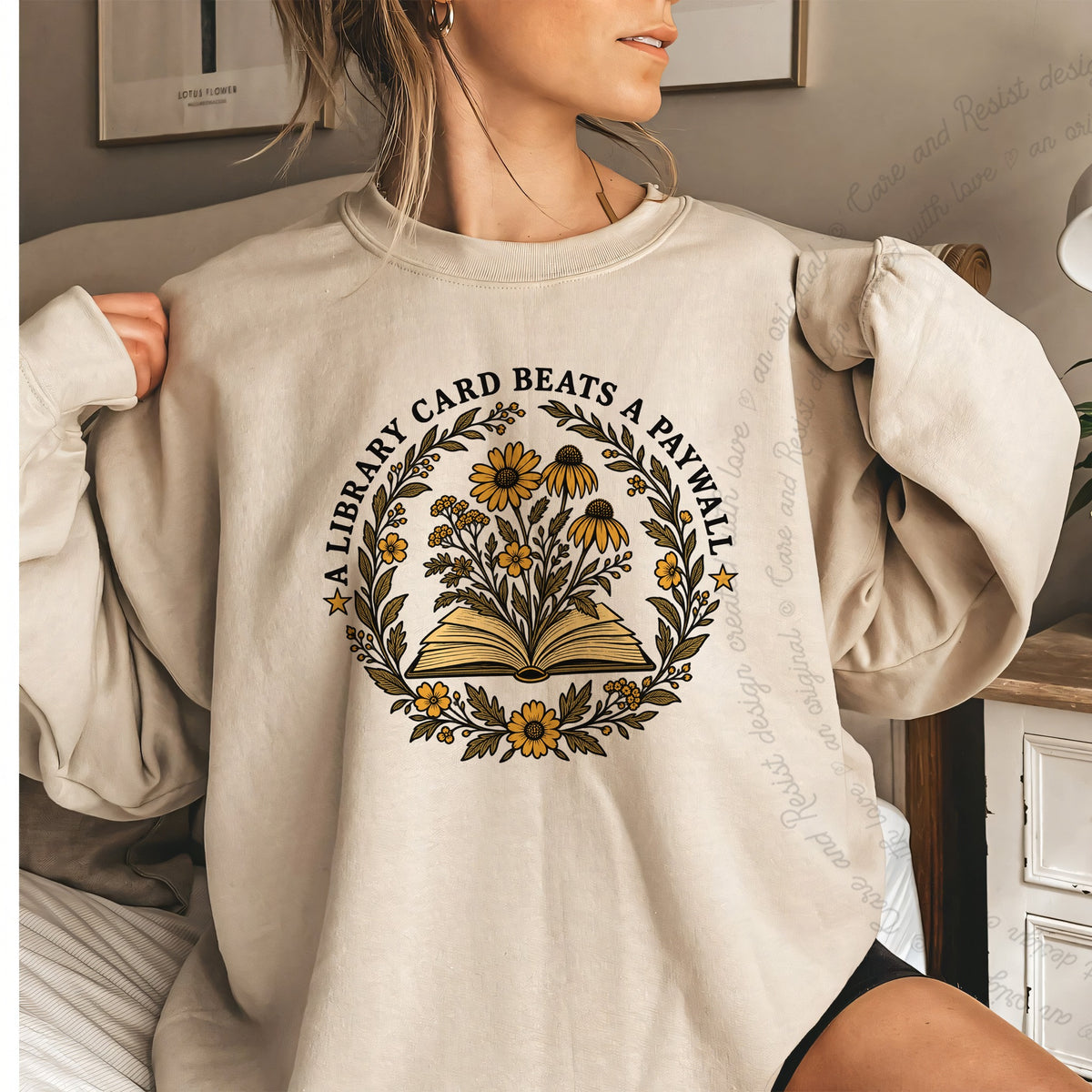 A Library Card Beats a Paywall Badge Care & Resist Gildan crewneck sweatshirt in Sand