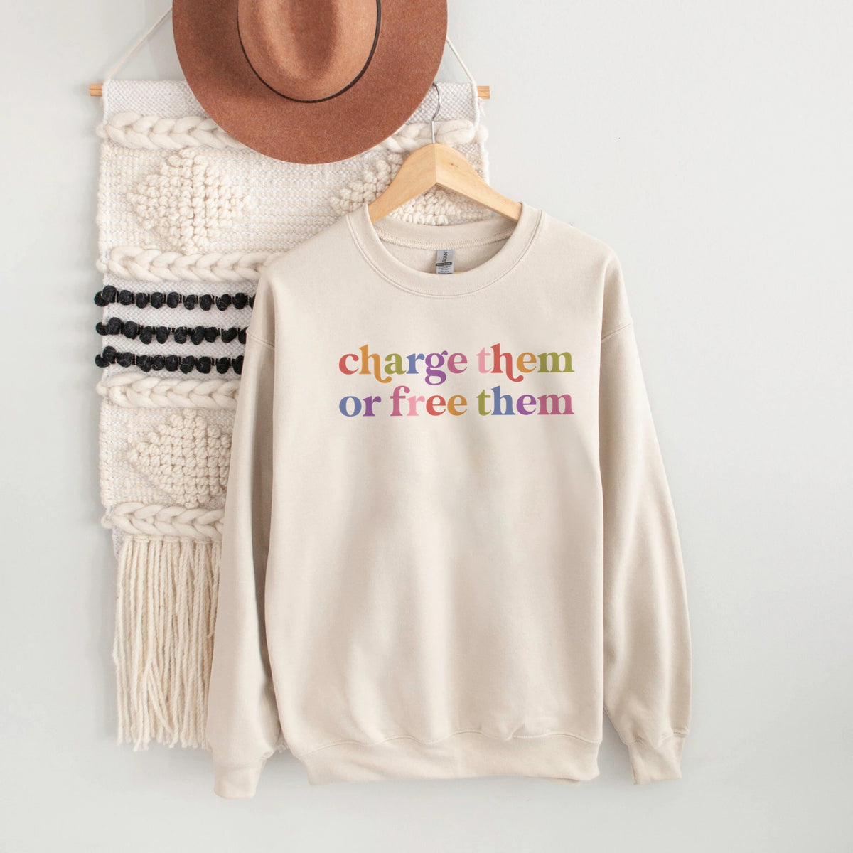 Charge Them or Free Them Care & Resist Gildan crewneck sweatshirt in Sand