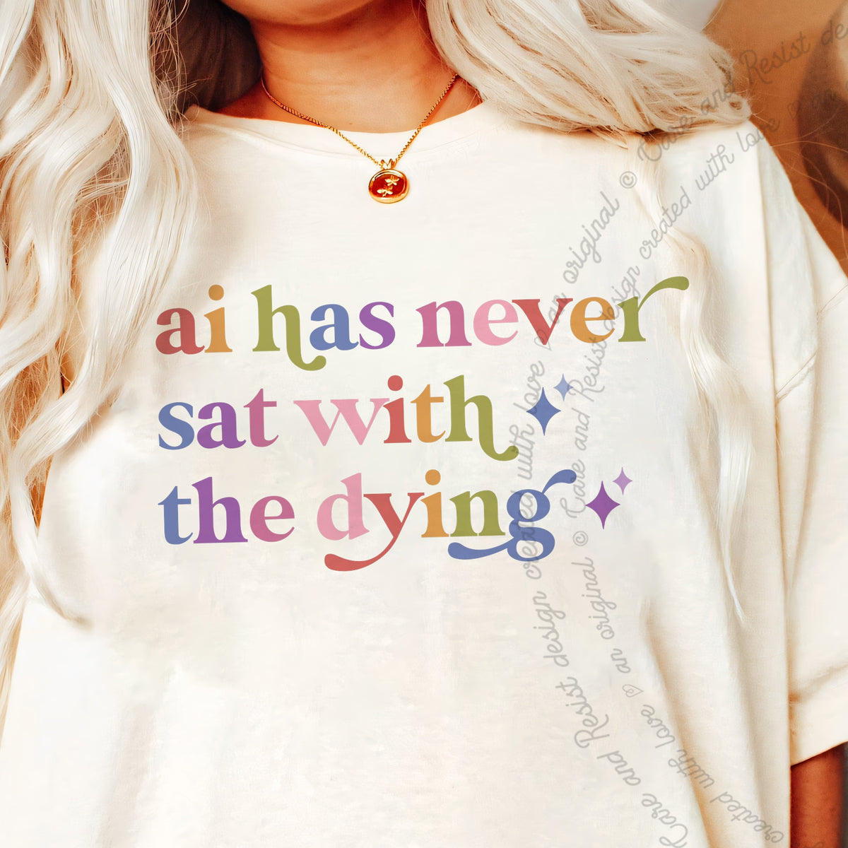 Ai Has Never Sat With the Dying Care & Resist tee in Ivory, close-up of the lettering