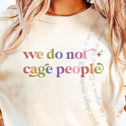 We Do not Cage People Care & Resist tee in Ivory, close-up of the lettering