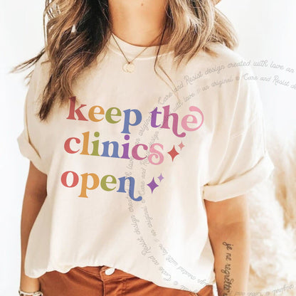 Keep the Clinics Open Care & Resist rainbow Comfort Colors tee, Ivory