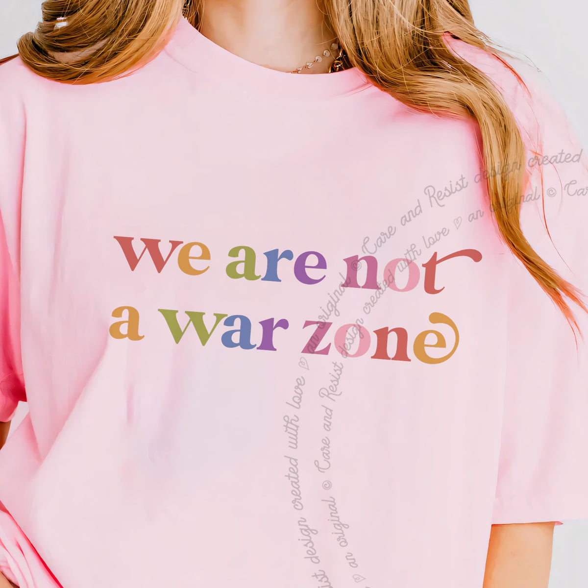 We are not a War Zone Care & Resist progressive t-shirt in Blossom