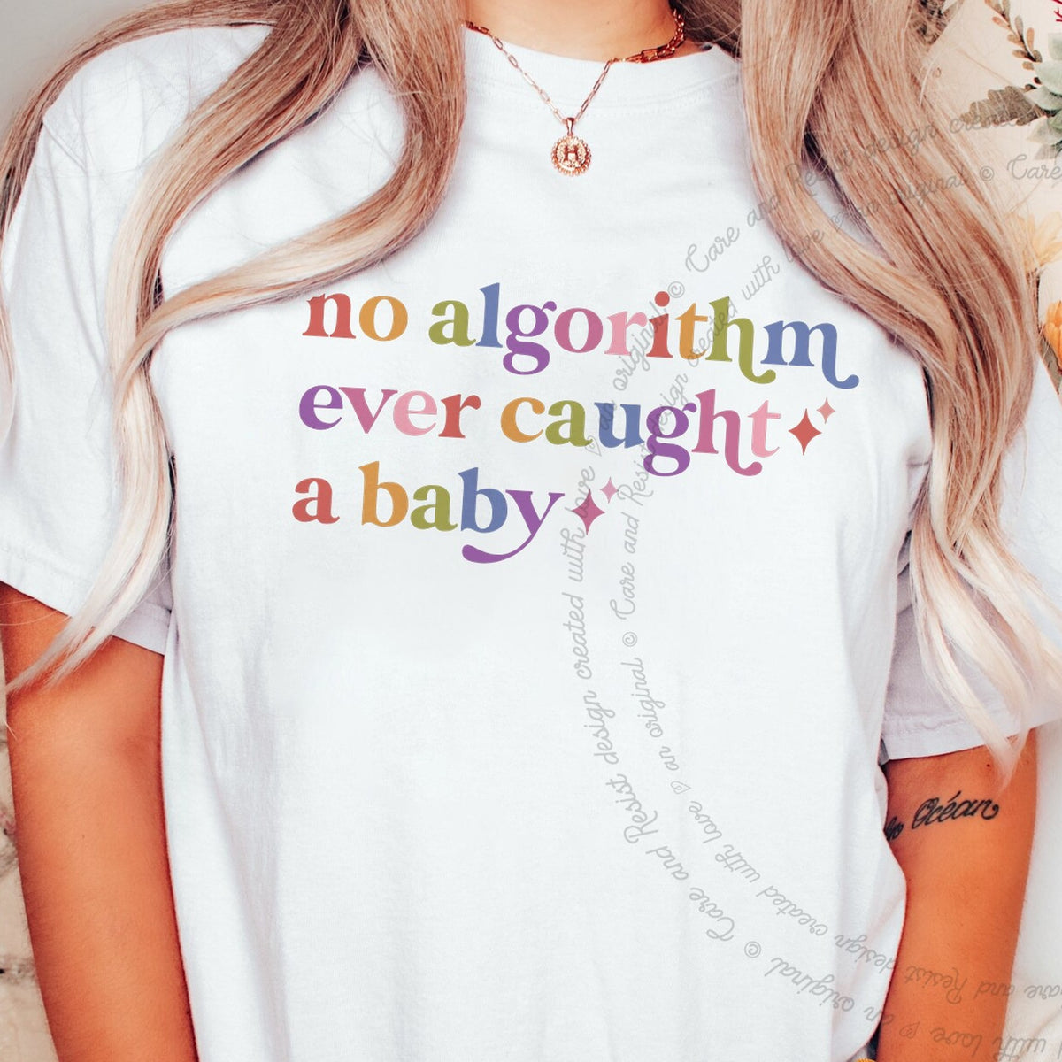No Algorithm Ever Caught a Baby Care & Resist tee in White
