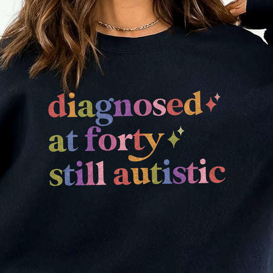 Diagnosed At Forty Still Autistic Care & Resist Gildan crewneck sweatshirt in Black
