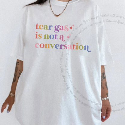Tear Gas is not a Conversation Care & Resist progressive t-shirt in White